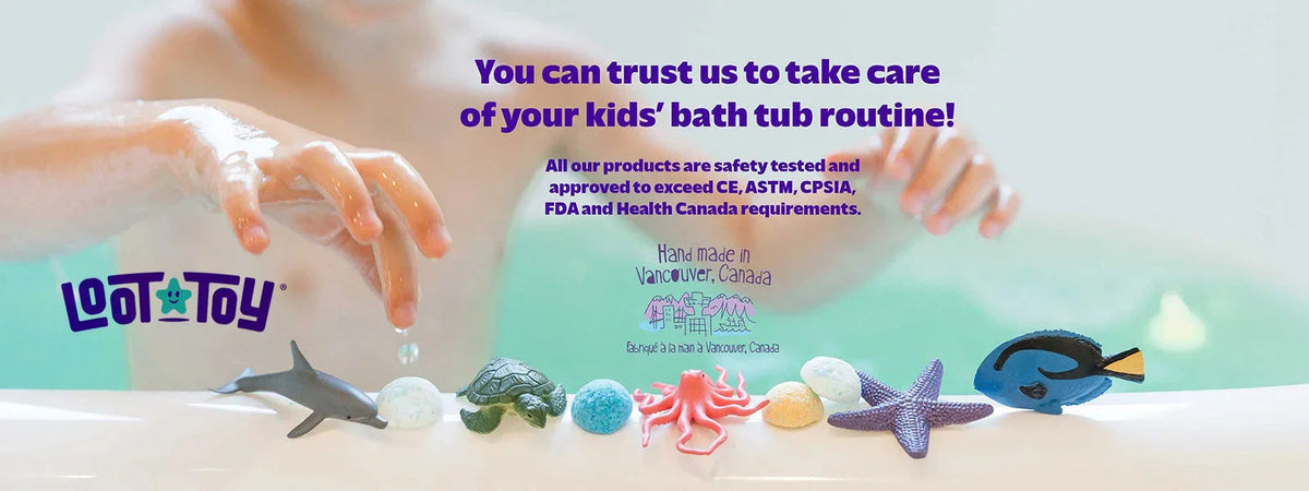 Child playing with colorful bath toys shaped like sea animals on a bathtub edge
