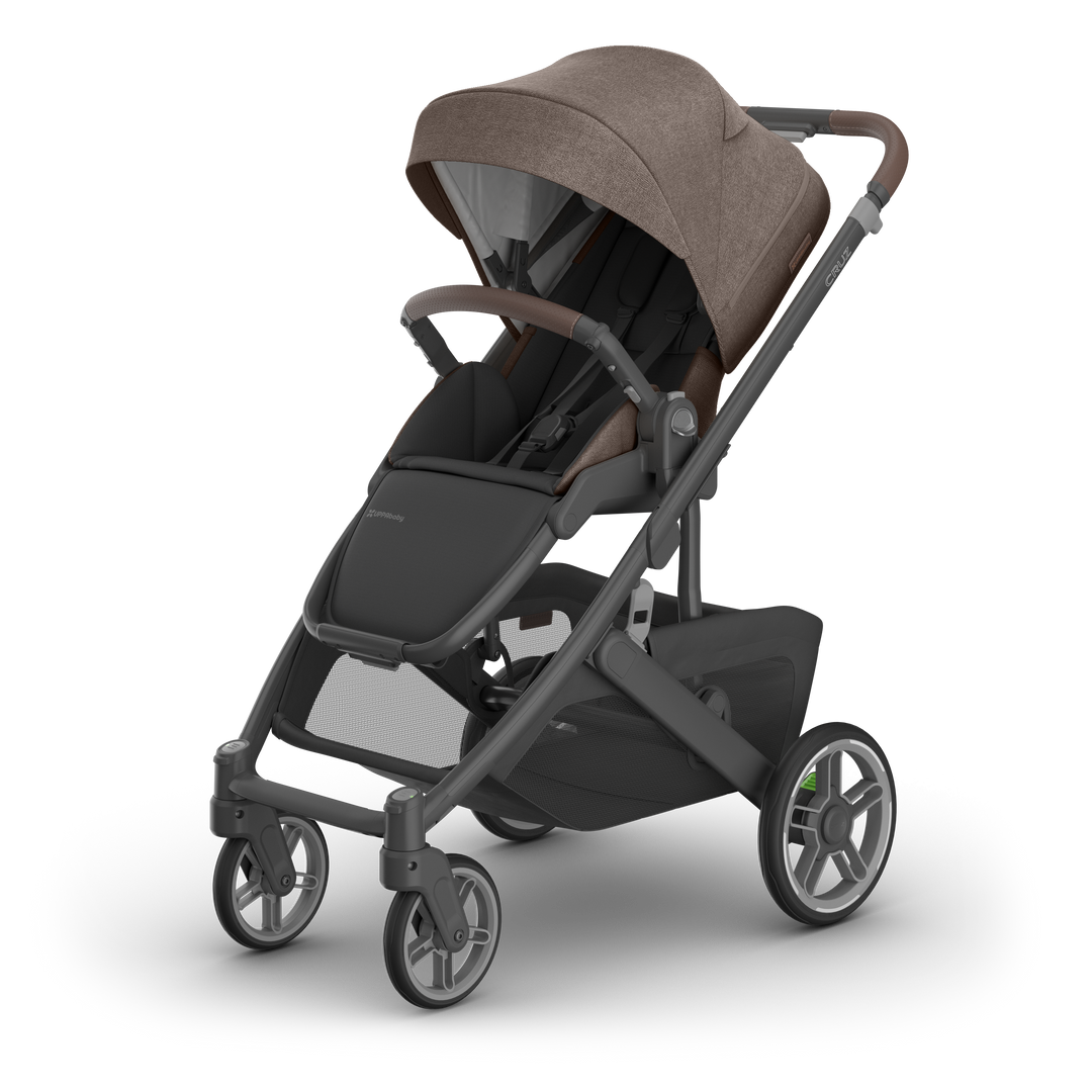 Brown and black baby stroller with canopy, padded seat, and storage basket