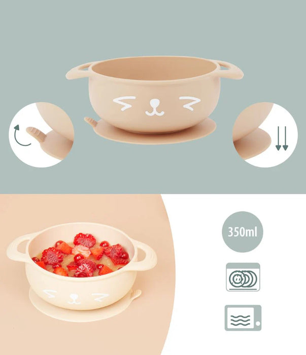 Beige silicone baby suction bowl with cute animal face, dual handles, filled with fruit, 350ml capacity, dishwasher and microwave safe