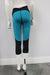 Matletik Flex Legging teal and black shown on mannequin, rear view against white background.