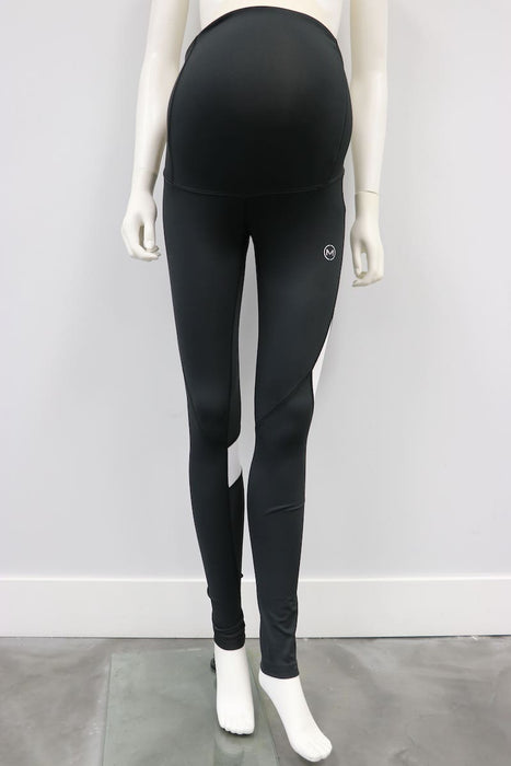 Courage Legging Black-White maternity leggings shown on a mannequin against a plain wall.
