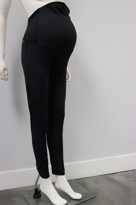Courage Legging Black maternity leggings displayed on a mannequin against a white wall.
