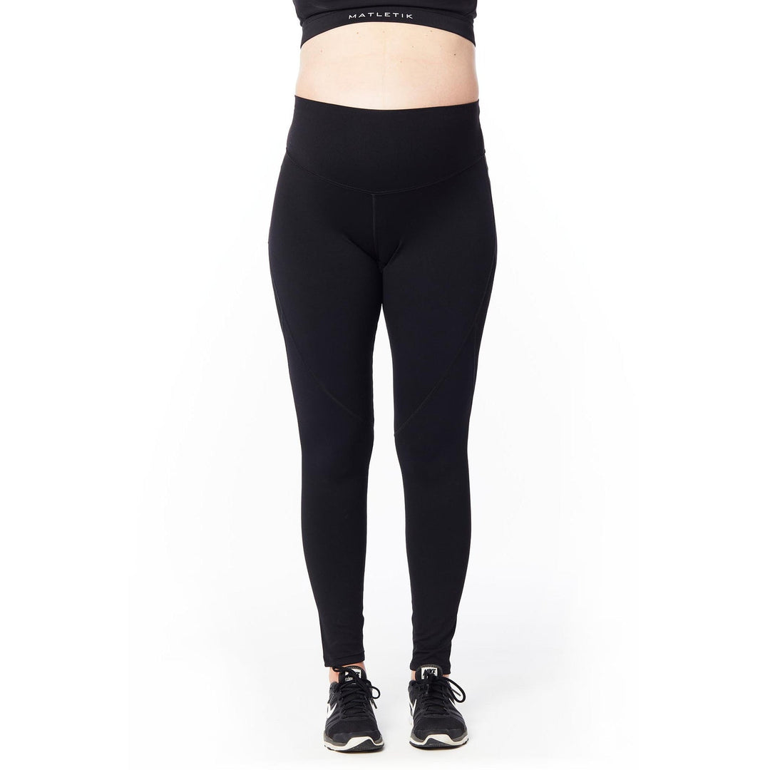 Matletik black maternity leggings shown on a standing model against a plain white background.