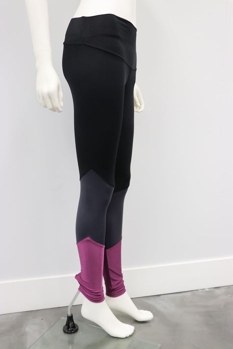 Balance Legging Black-Raisin shown on a mannequin with black, grey, and purple color block design.