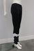 Zen Legging Black-White shown on mannequin, full length with contrasting white detail at calves.