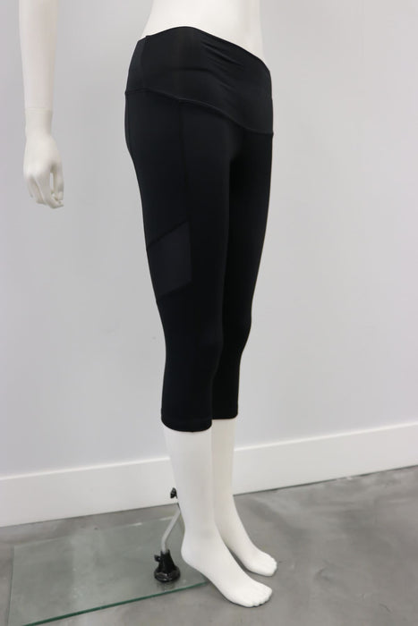 Esprit black cropped leggings displayed on a mannequin against a plain white background.