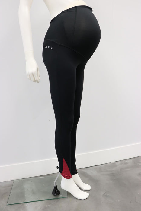 Karma Legging Black-Raspberry maternity leggings shown on a mannequin against a plain wall.