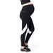 Matletik maternity leggings in black with white accents, shown on a pregnant woman standing sideways.