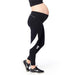 Matletik maternity leggings in black and white, shown worn by a pregnant woman standing sideways.
