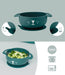 Green silicone suction baby bowl with a cute animal face, two handles, 350ml capacity.