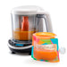 Baby Brezza baby food maker with a colorful food pouch filled with pureed food on a white background.