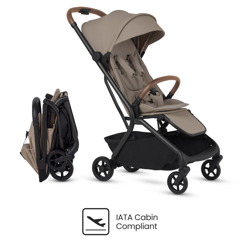 Beige lightweight baby stroller with brown handles, shown open and folded, IATA cabin compliant.