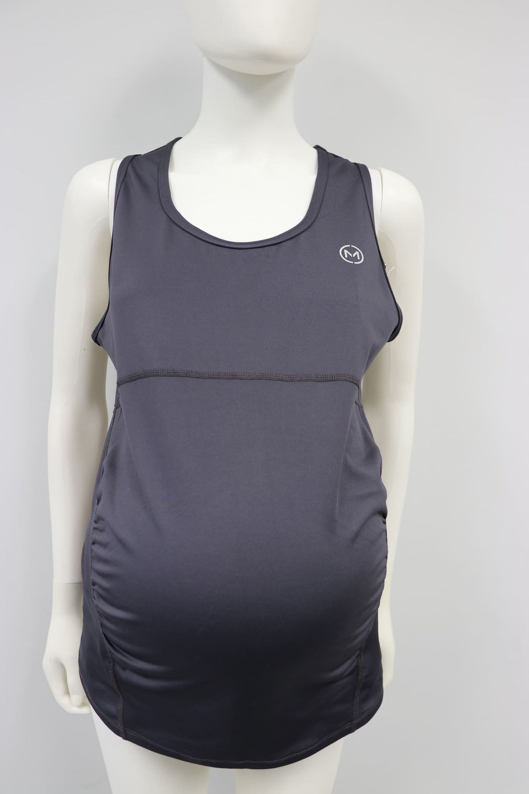 Dark grey maternity tank top with scoop neck displayed on a mannequin against a white background.