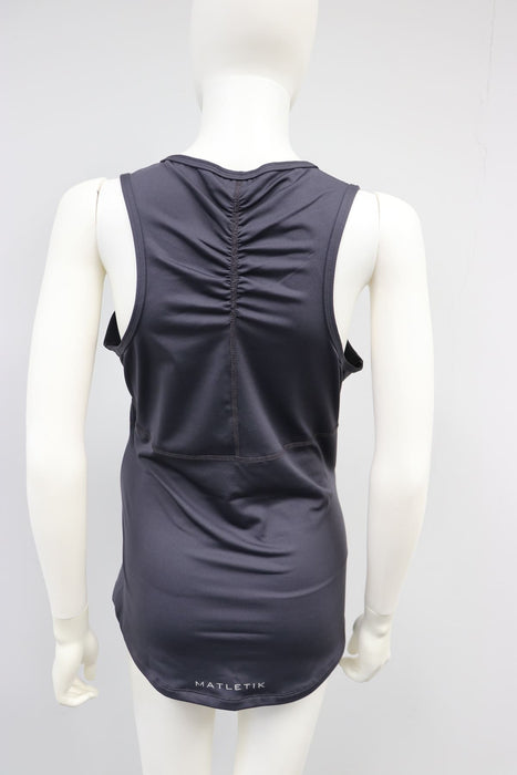 Matletik black athletic tank top shown on mannequin, back view with ruched detailing.