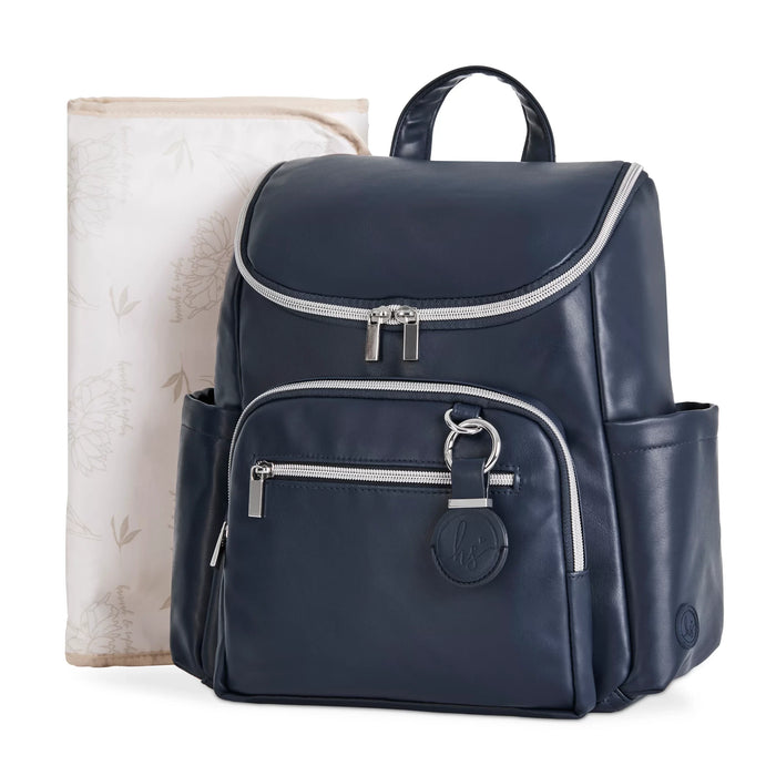 Navy blue diaper backpack with silver zippers and side pockets, paired with a soft changing pad.