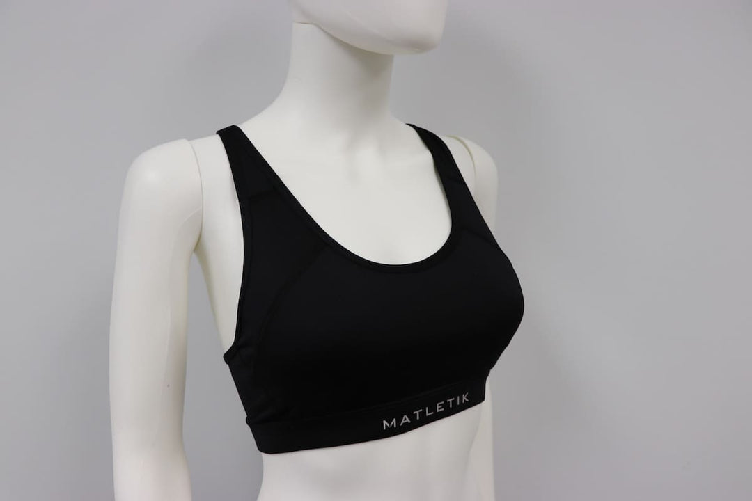 Matletik black bra top displayed on a mannequin against a plain background.