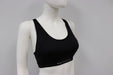 Matletik black bra top displayed on a mannequin against a plain background.