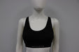 Matletik black bra top displayed on mannequin against plain background.
