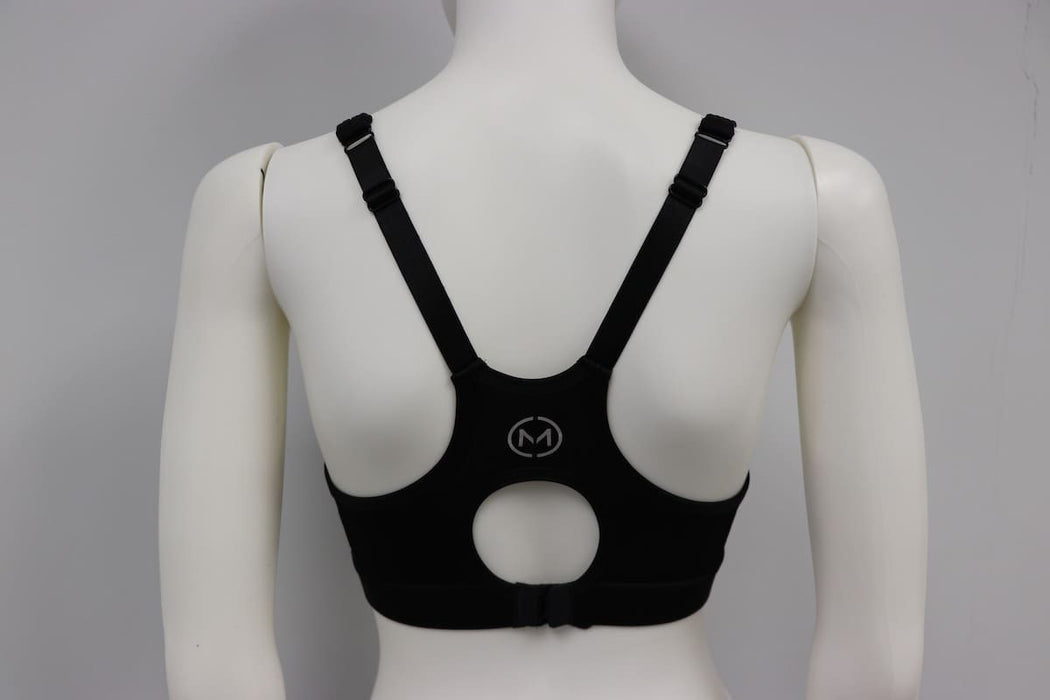 Black bra top with racerback and adjustable straps shown on mannequin from the back view.