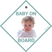 EziMoov Baby on Board car sign featuring a baby with curly hair, picking nose, on a white background.