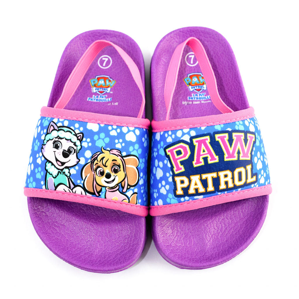 Paw Patrol girls' sandals featuring cartoon characters and paw prints on a white background.