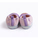 Girls Paw Patrol slippers shown from the back, featuring pink and purple plush fabric with paw prints.