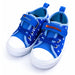 Paw Patrol boys blue canvas shoes with character names Chase and Marshall, shown on white background.