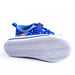 Paw Patrol boys canvas shoe in blue shown from the side and bottom, featuring cartoon graphics.
