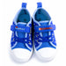 Paw Patrol boys canvas shoes in blue with Chase and Marshall designs shown from above on white background.