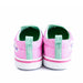 Girls' Paw Patrol slip-on canvas shoes in pink shown from the back on a white background.