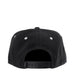 Black snapback cap shown from the back with adjustable closure and white eyelets on a white background.