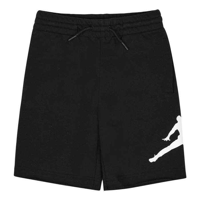 Black kids' athletic shorts with white graphic print on leg, shown flat on a plain background.