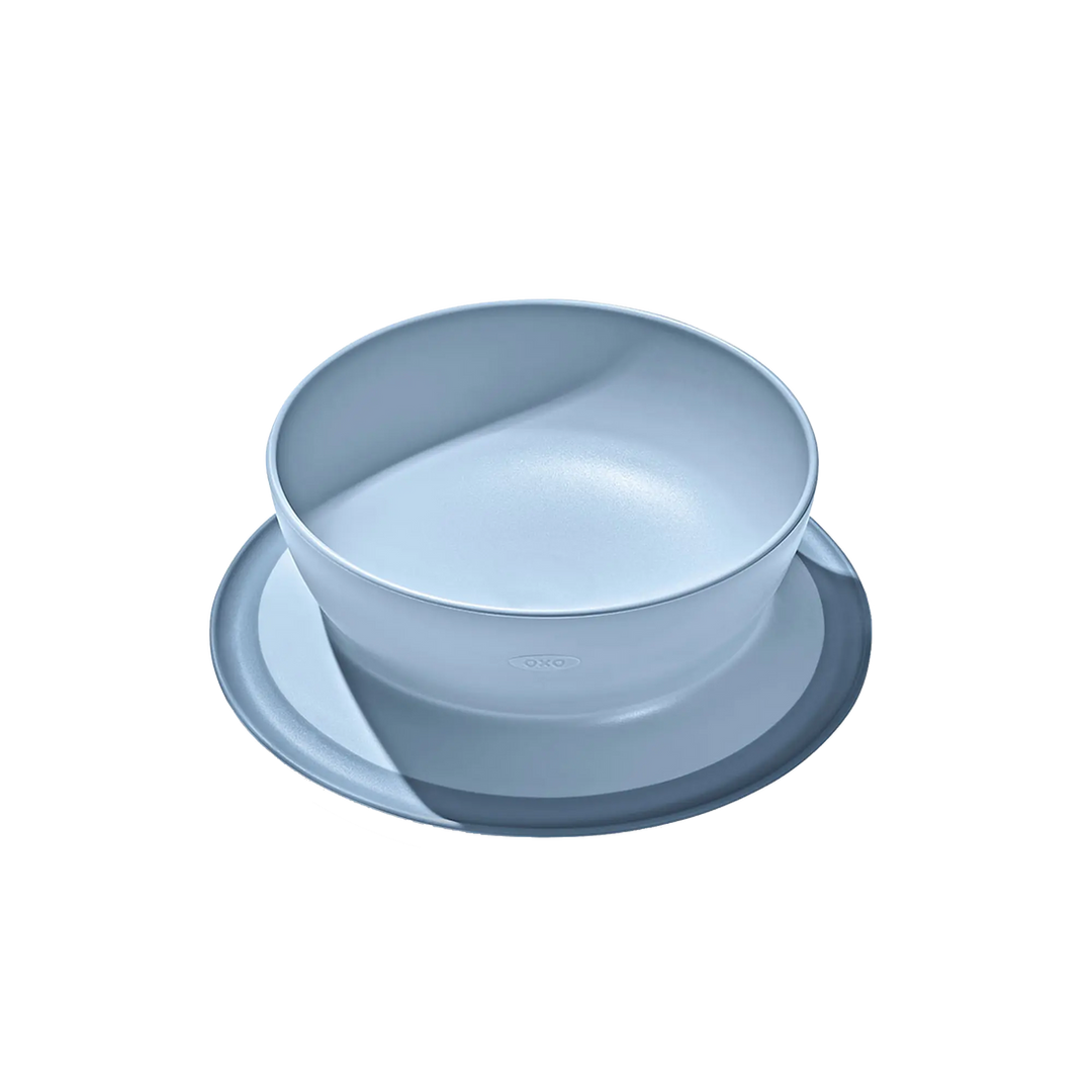 Light blue baby feeding bowl with non-slip base on a white background