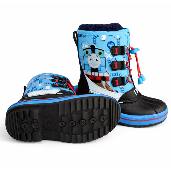 Thomas the Train kids’ winter boots with blue uppers and traction soles, shown on a white background.