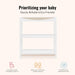White wooden changing table with shelves, eco-friendly and sturdy baby furniture