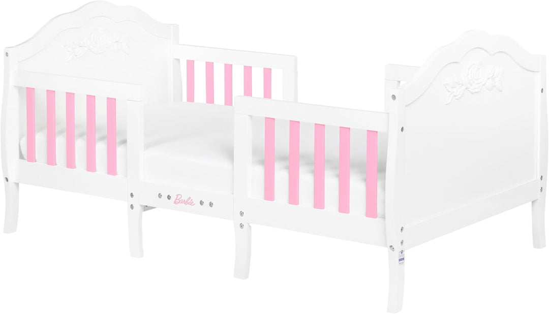 White and pink toddler bed with floral details and Barbie logo, perfect for kids' bedrooms