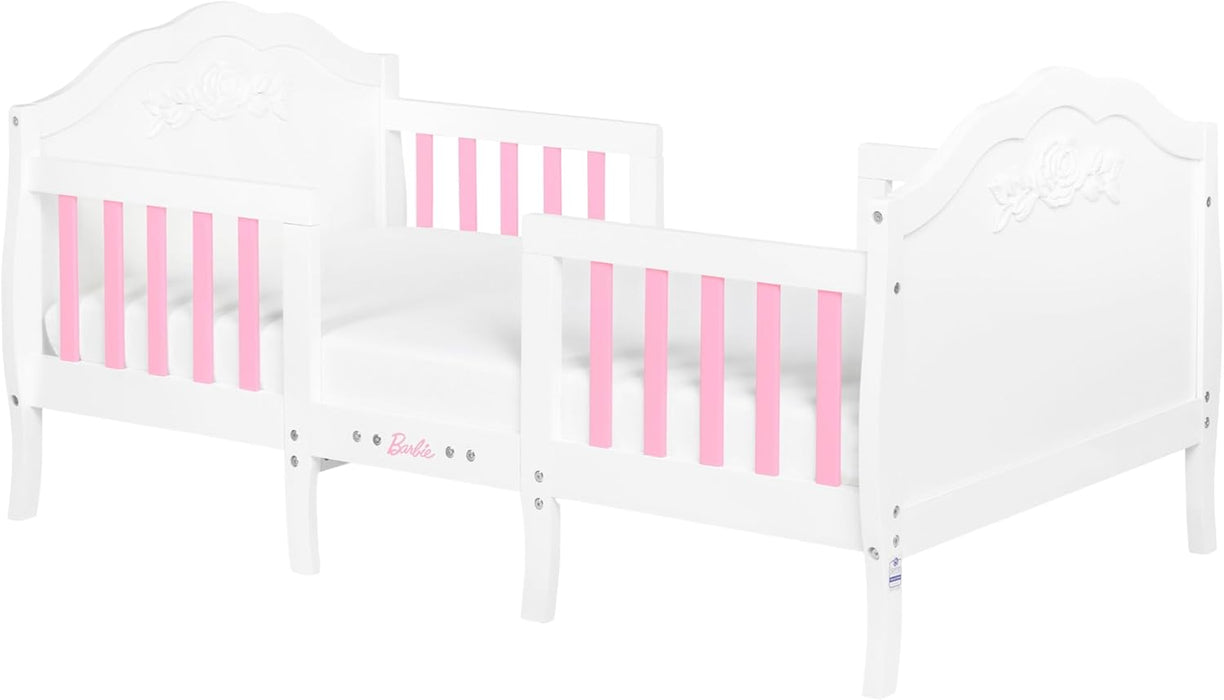 White and pink toddler bed with floral details and Barbie logo, perfect for kids' bedrooms