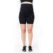 Matletik black maternity bike shorts shown on a standing pregnant woman against a white background.