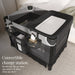 Convertible baby changing station with storage, diapers, and wipes in a nursery setting