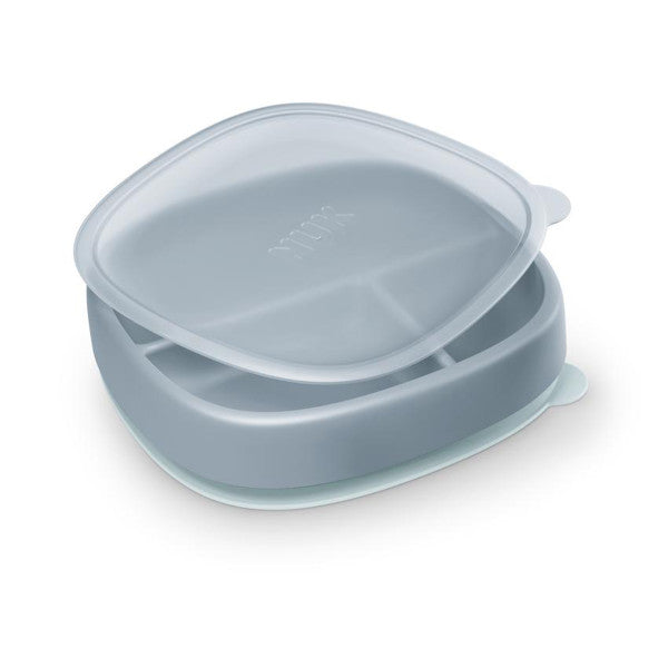 NUK divided baby plate with leak-proof lid shown on a white background.