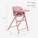 Pink baby high chair with tray and footrest, dimensions 33.75 x 30 x 20 inches shown