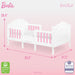 White and pink Barbie toddler bed by évolur with floral detail, dimensions 25.4 x 53.3 x 31.2 inches, Greenguard Gold and JPMA certified.