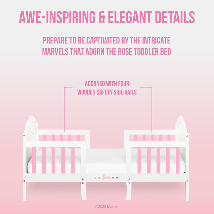 White and pink toddler bed with four wooden safety side rails, Barbie theme, on pink background