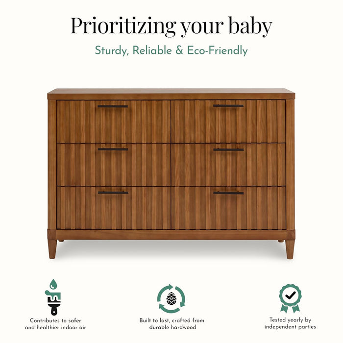 Modern wooden baby dresser with three drawers, eco-friendly and made from durable hardwood.