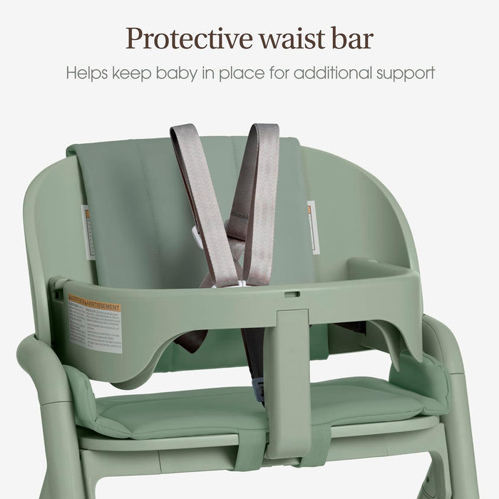 Green baby high chair with safety harness and protective waist bar for secure seating