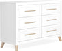 Modern white six-drawer dresser with gold handles and angled legs, nursery furniture