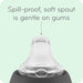 NUK spill-proof sippy cup soft spout close-up with gentle on gums text on light green background.