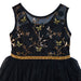 Black glitter dress with gold sequin butterfly and floral embroidery shown on a plain background.