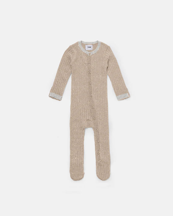 7AM Hug Me Ribbed Knit Romper in beige with long sleeves, laid flat on a white background.