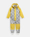 7AM rain coverall for kids in yellow and grey with star pattern, displayed flat on a white background.